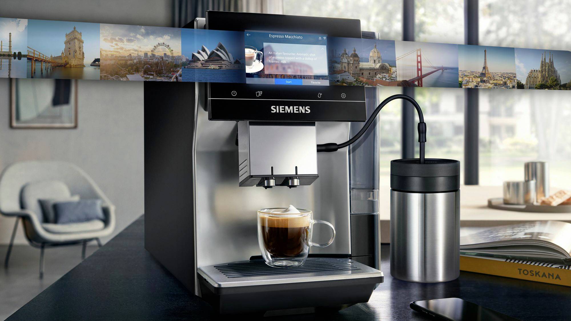 A Siemens coffee machine sits on a table, ready to pour a freshly brewed espresso into a glass cup.