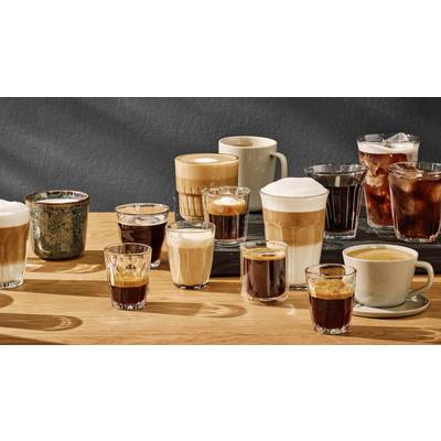 A selection of different coffee varieties in glasses and cups, including espresso, cappuccino, latte and iced coffee, on a wooden table.