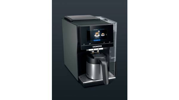 A black Siemens coffee machine with a digital display, showing symbols for different types of coffee.