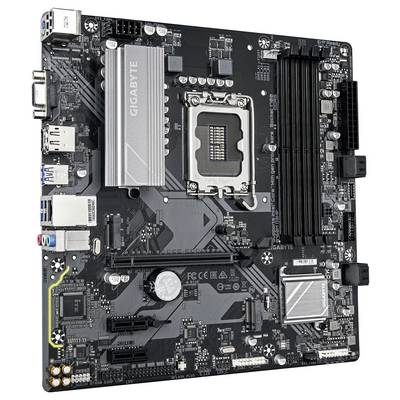 A black computer motherboard with various ports and a CPU socket in the centre.