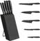 A black knife block with five knives in different sizes. The blades are smooth or serrated, depending on their purpose.