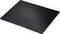 A black, rectangular non-stick baking mat that serves as a reusable surface for oven baking.