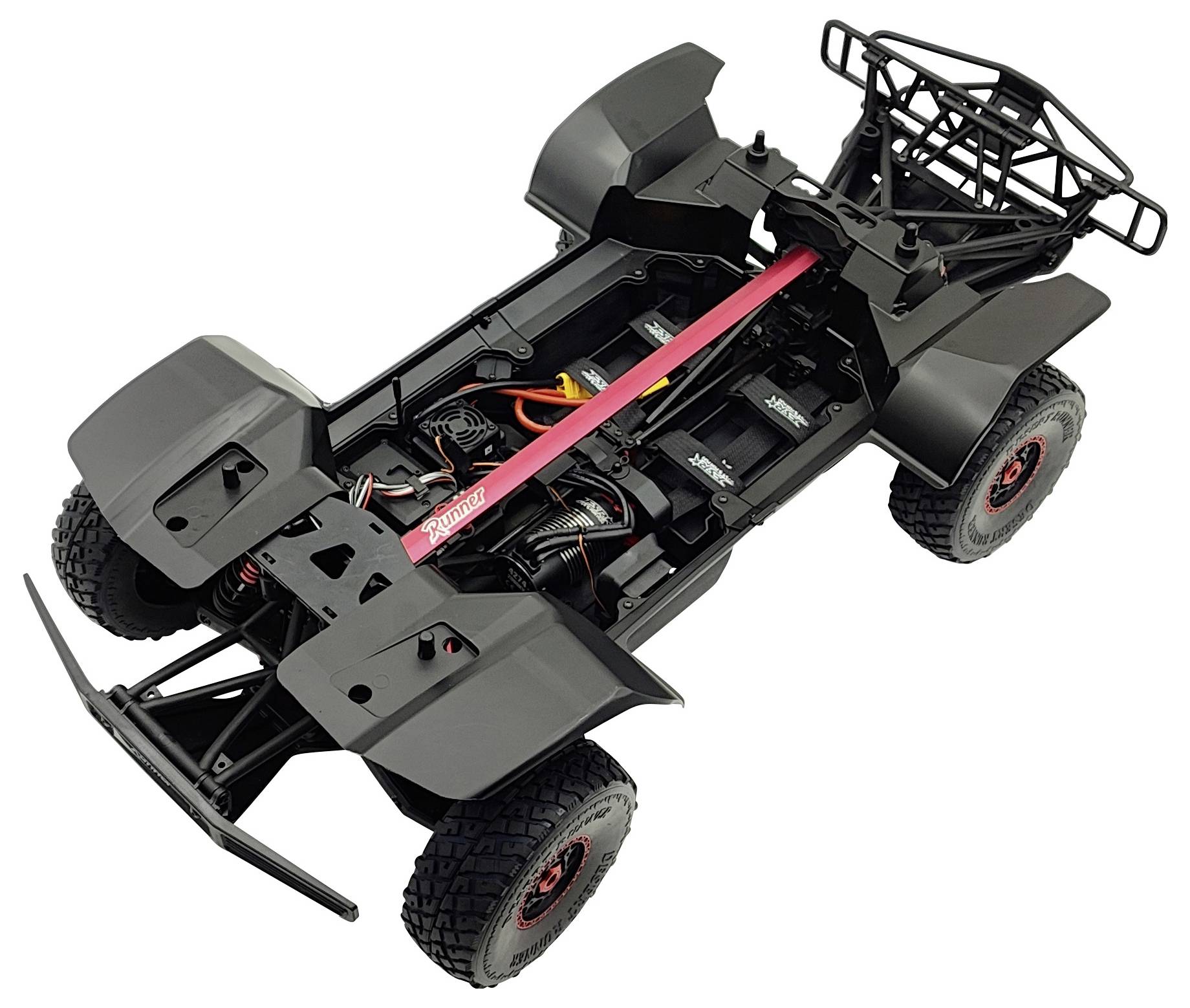 A remote-controlled car chassis without bodywork, showing wheels, suspension, and electronic components.