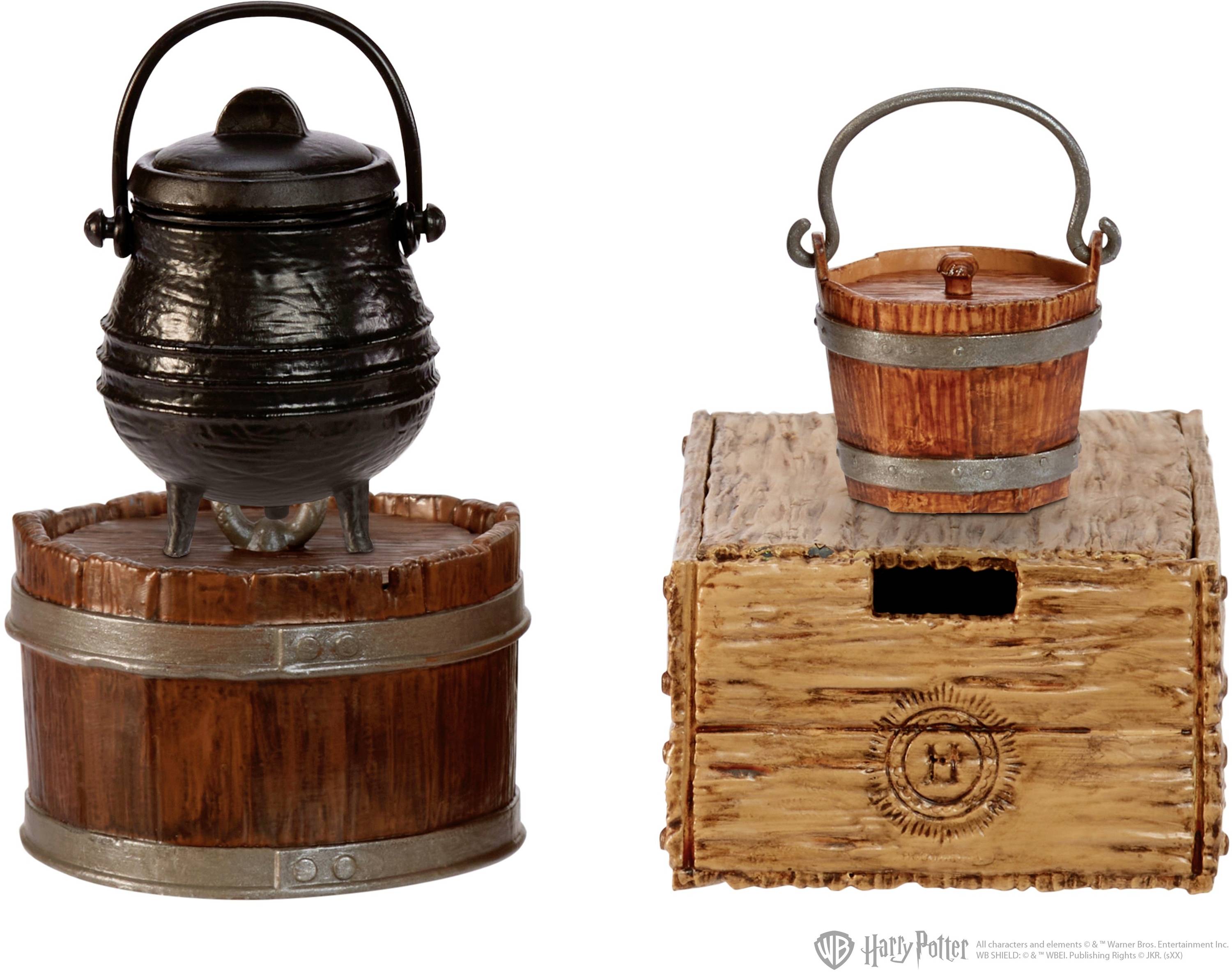'A miniature reproduction of a large black cauldron on a wooden barrel and a small bucket on a wooden crate.'