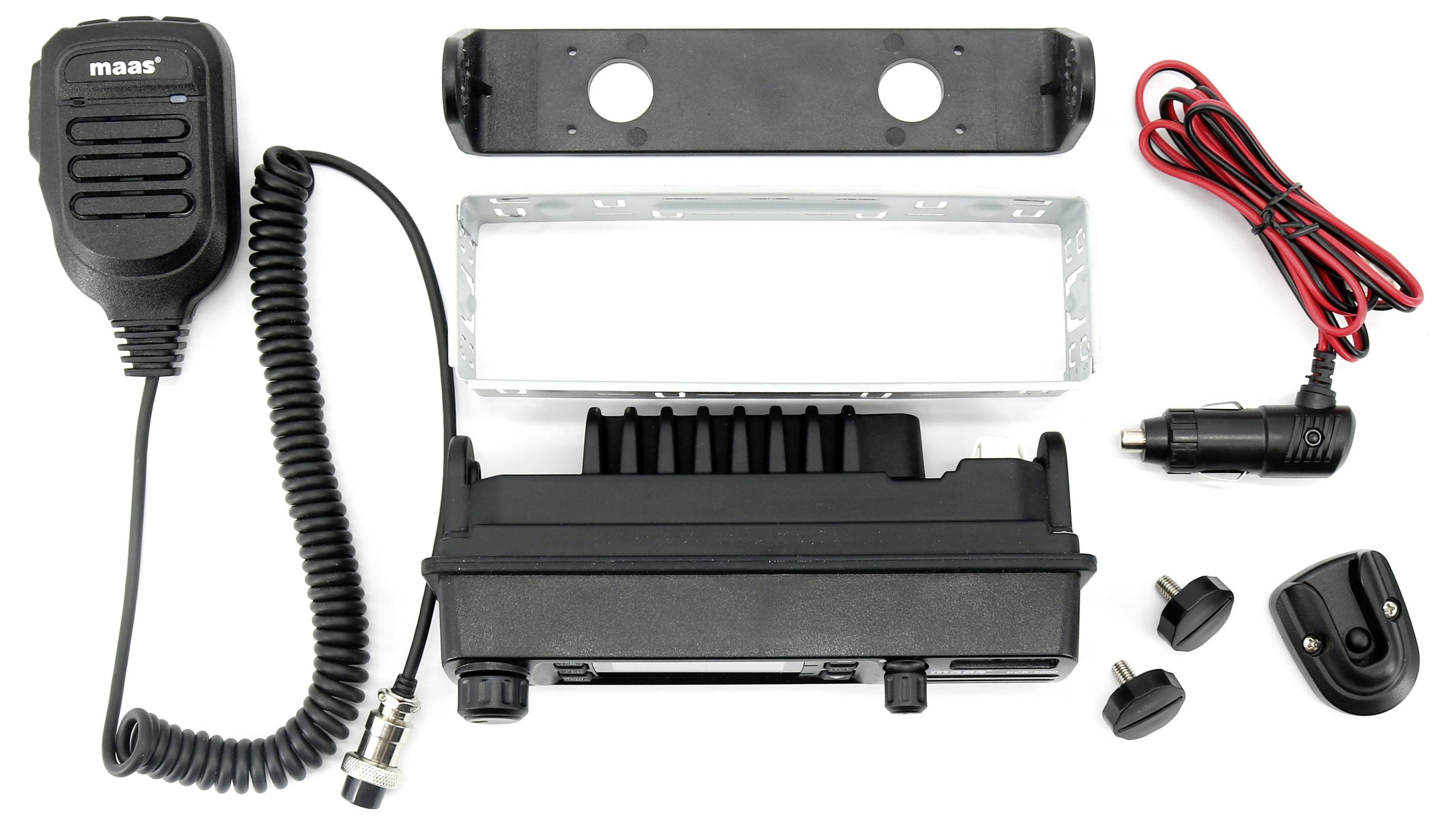 Communication radio set with microphone, mounting bracket, cable and accessories on white background.