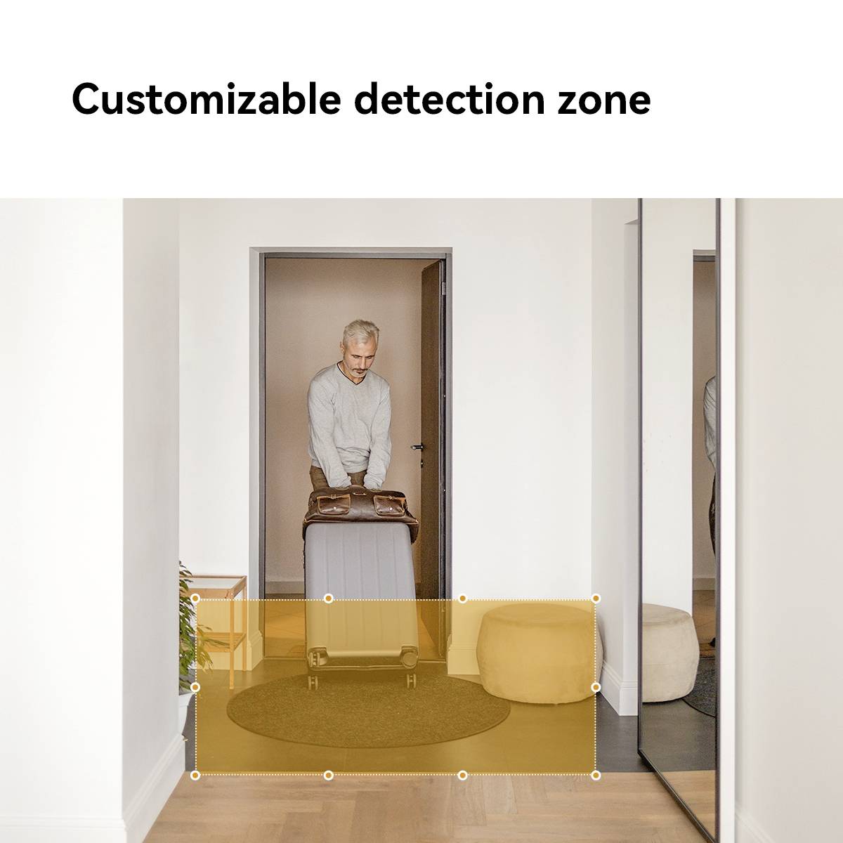 Older gentleman pushing a suitcase through a door. The text at the top reads 'Adjustable Recognition Zone'.