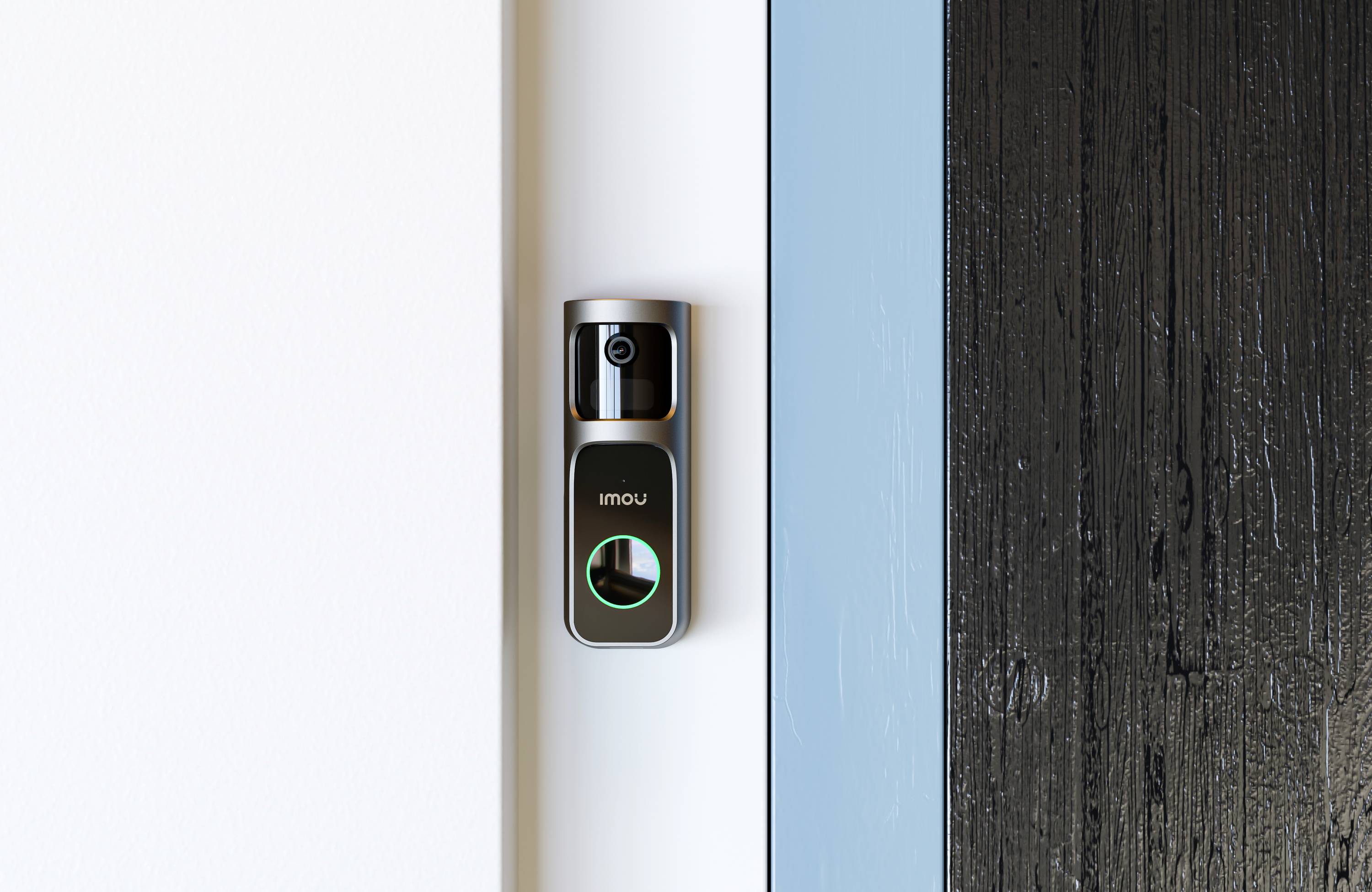 A smart doorbell with a camera and illuminated button is mounted on a two-tone wall. It provides security monitoring.