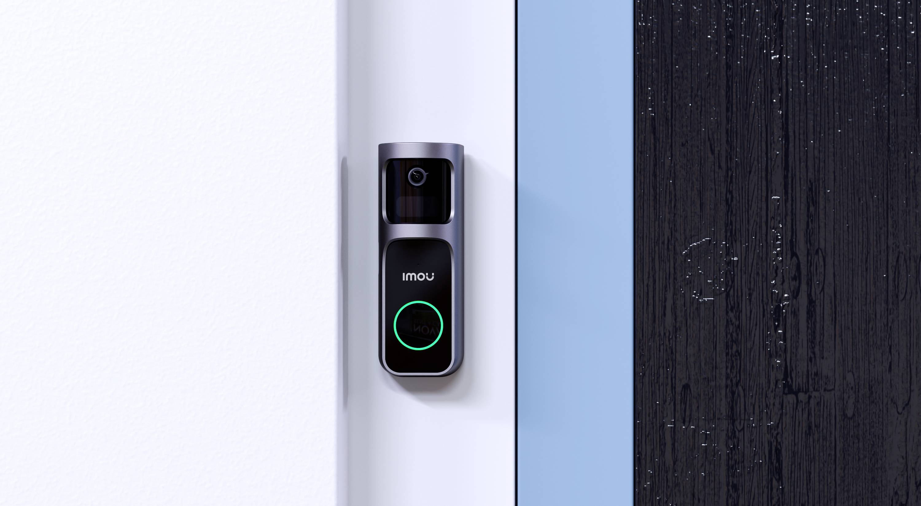 Video doorbell mounted on a white wall, displaying the 'imou' logo with a blue-green LED ring; integrated into a modern home environment.