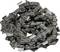 A chainsaw chain lies in a loose loop on a surface. The chain links are metallic with toothed edges.