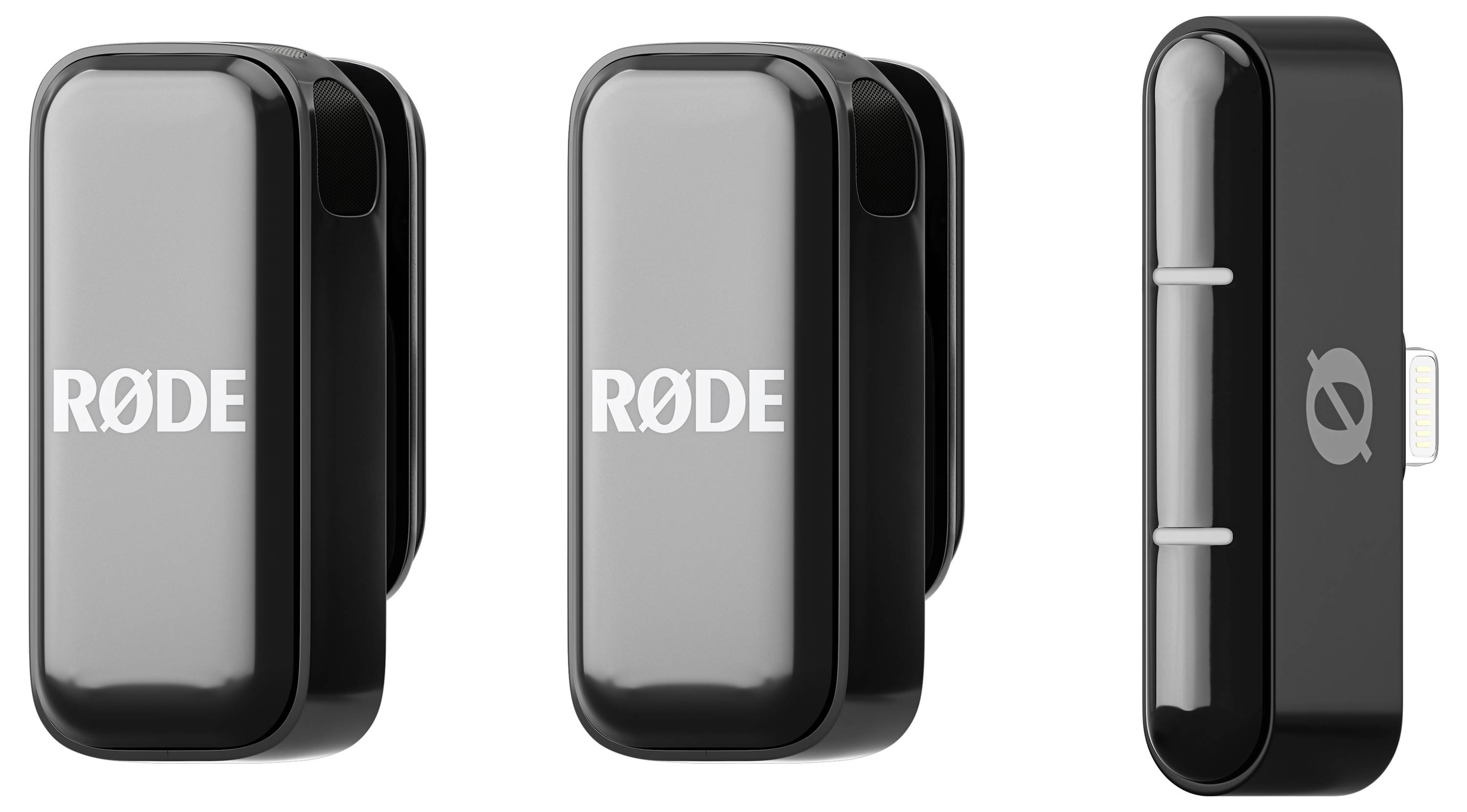 Two black RØDE microphones and an adapter. The microphones bear the 'RØDE' inscription, and the adapter shows three white lines.