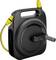 Black hose reel with yellow hose and nozzle attachment, handy handle on top, crank on the side for winding up the hose.