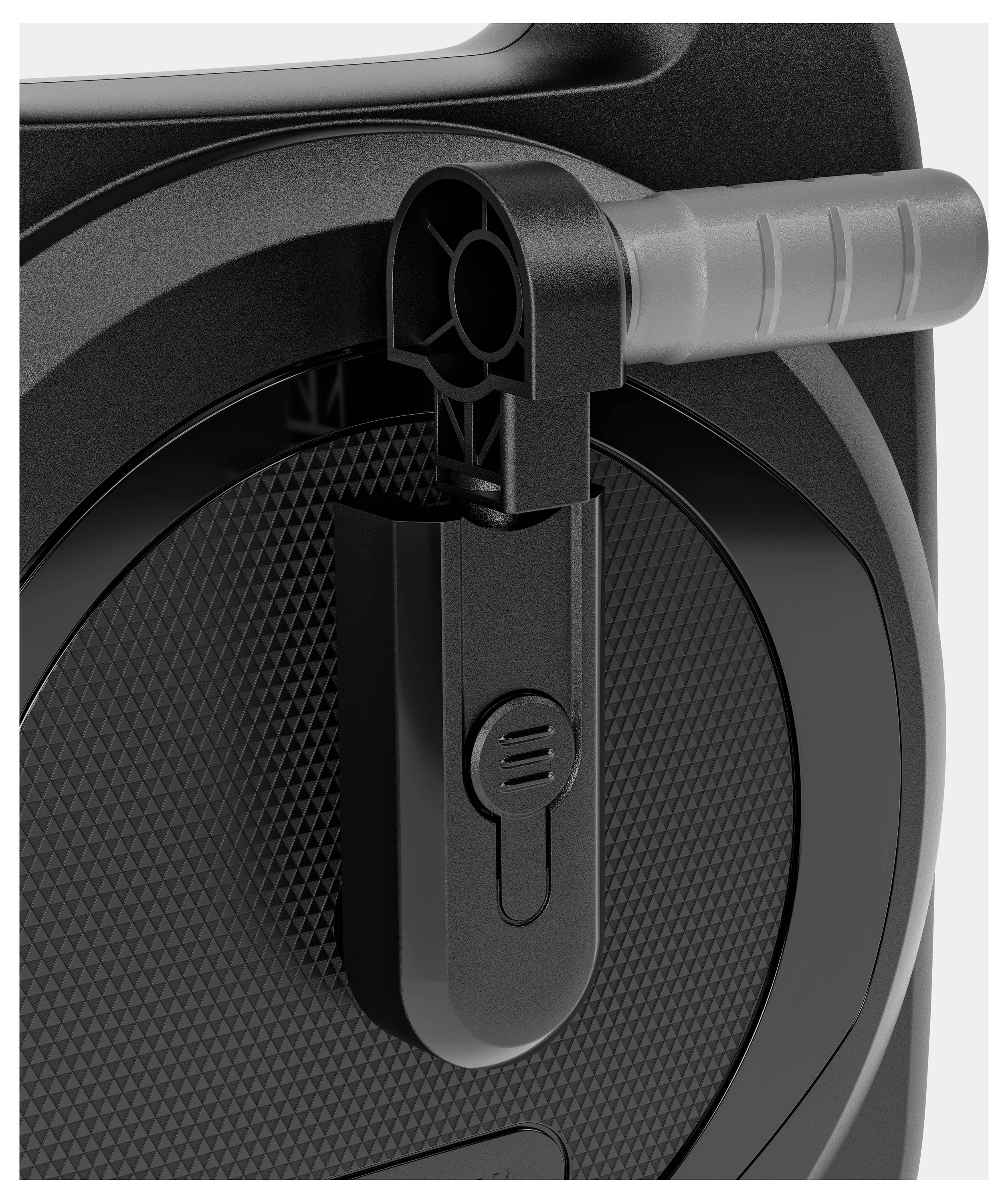 A black plastic wheel with a handle on a device that appears to be used for fastening or locking purposes.