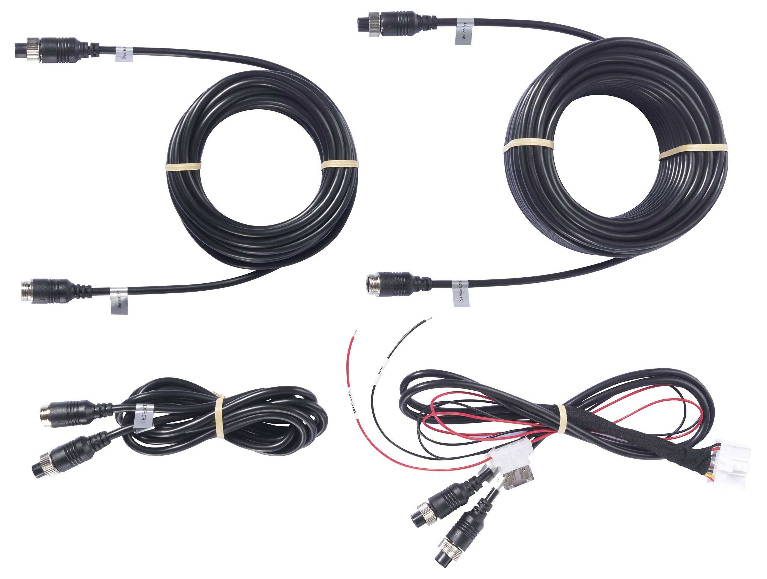 Various black coaxial cables and adapters with connectors, laid out side by side, suitable for video or power connections.
