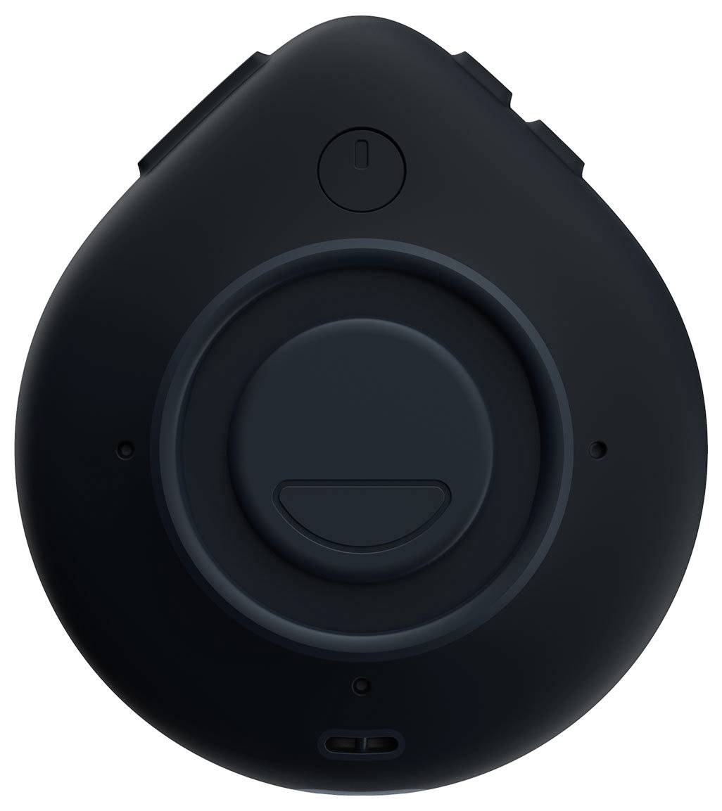 A round, black key fob with a central button element and two smaller buttons on the sides.