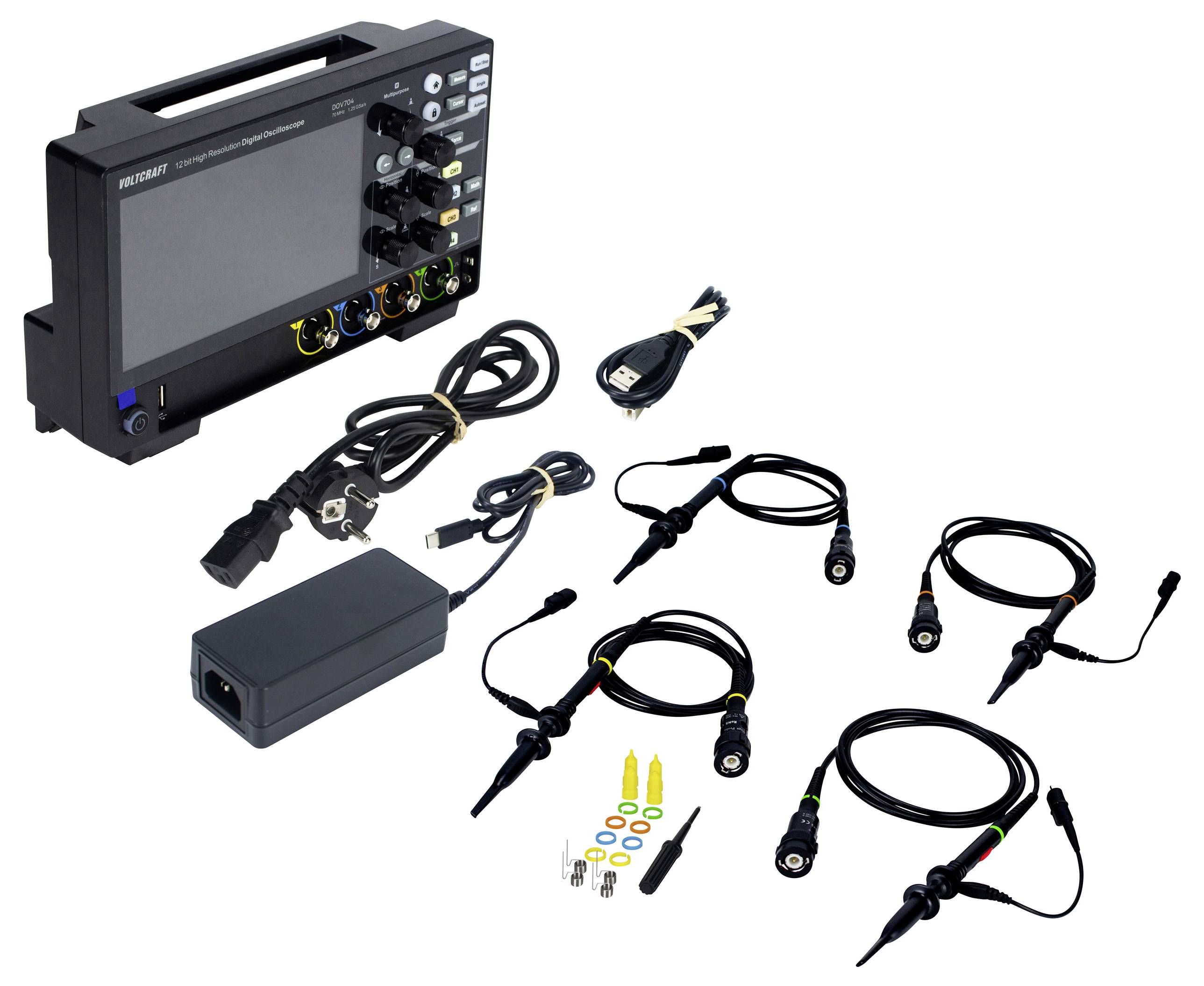 Oscilloscope with various cables and accessories for electronic measurement and display of signals, arranged to the side.