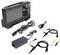 A digital oscilloscope with accessories: signal cables, power adapter, probes, and accessory parts for signal verification and analysis.