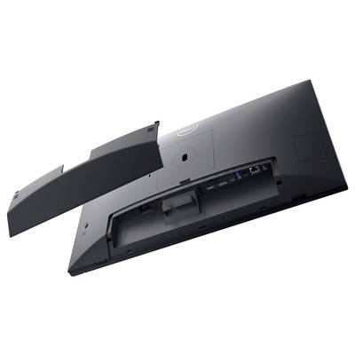 Back of a computer monitor with a removable cover piece that reveals connection ports such as HDMI and USB.