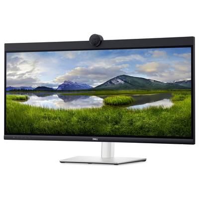 Wide computer screen displays a landscape photograph with a lake, grass-covered hills, and a cloudy sky beneath.