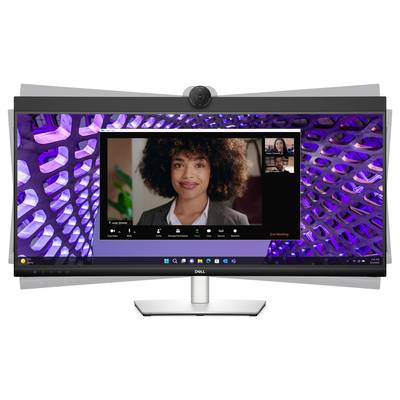 A person on a video call on a computer screen; an illuminated structure in the background. The participant list is visible.