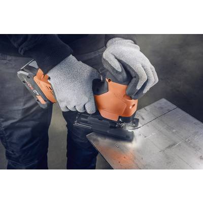 A person is sawing a metal plate with an electric jigsaw. They are wearing grey gloves for protection.