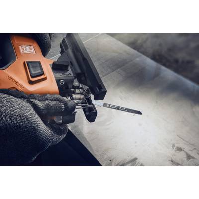 A person is holding an electric jigsaw, ready to cut metal. The person is wearing work gloves for safety.