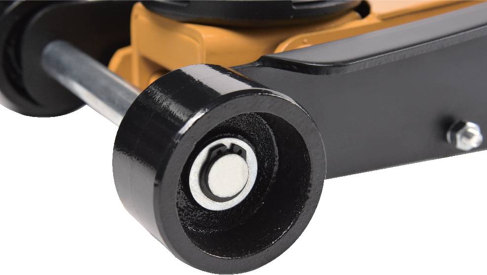 Close-up of a black metal dolly wheel and metal axle, highlighting its solid construction and smooth surface.