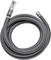 Grey flexible metal hose, coiled, with connections at both ends, suitable for industrial applications.