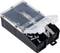 An open black plastic toolbox with various screws and wall plugs; the box is divided into multiple compartments.