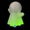 White ghost figure with a luminously green base, set against a black background.