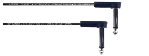 Two black angled jack audio cables with the inscription 'Cordial Germany Instrument' and specifications along the cables.