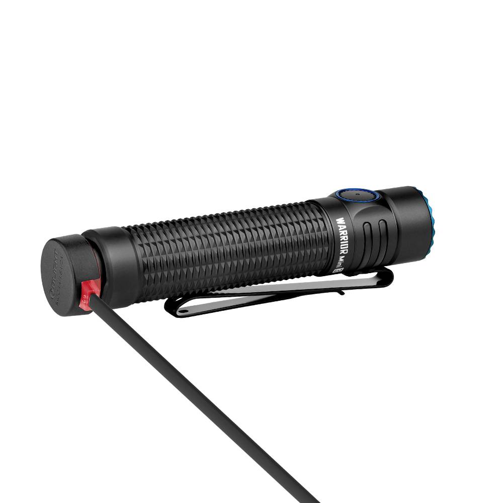 Black, cylindrical torch with a ridged surface and side clip on a white background.