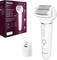 A Panasonic electric epilator with a removable head and packaging in the background. Text on the packaging describes features.