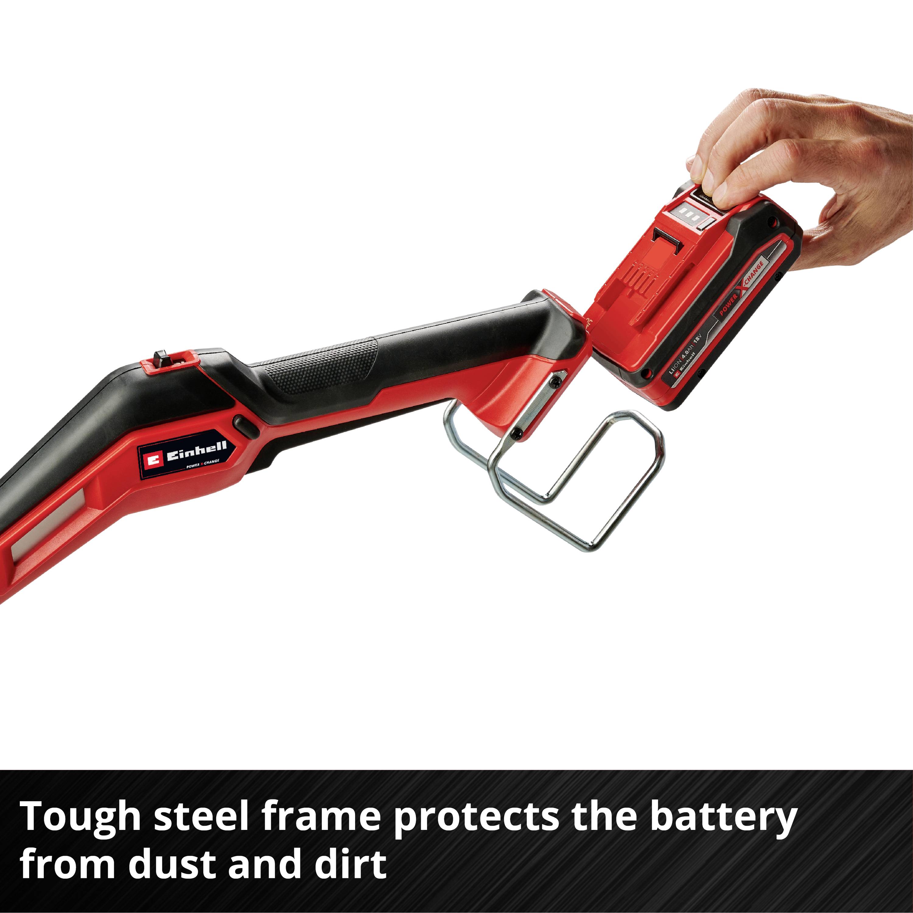 A hand is inserting a battery into a red power tool. The text underneath reads: 'Robust steel frame protects the battery from dust and dirt'.