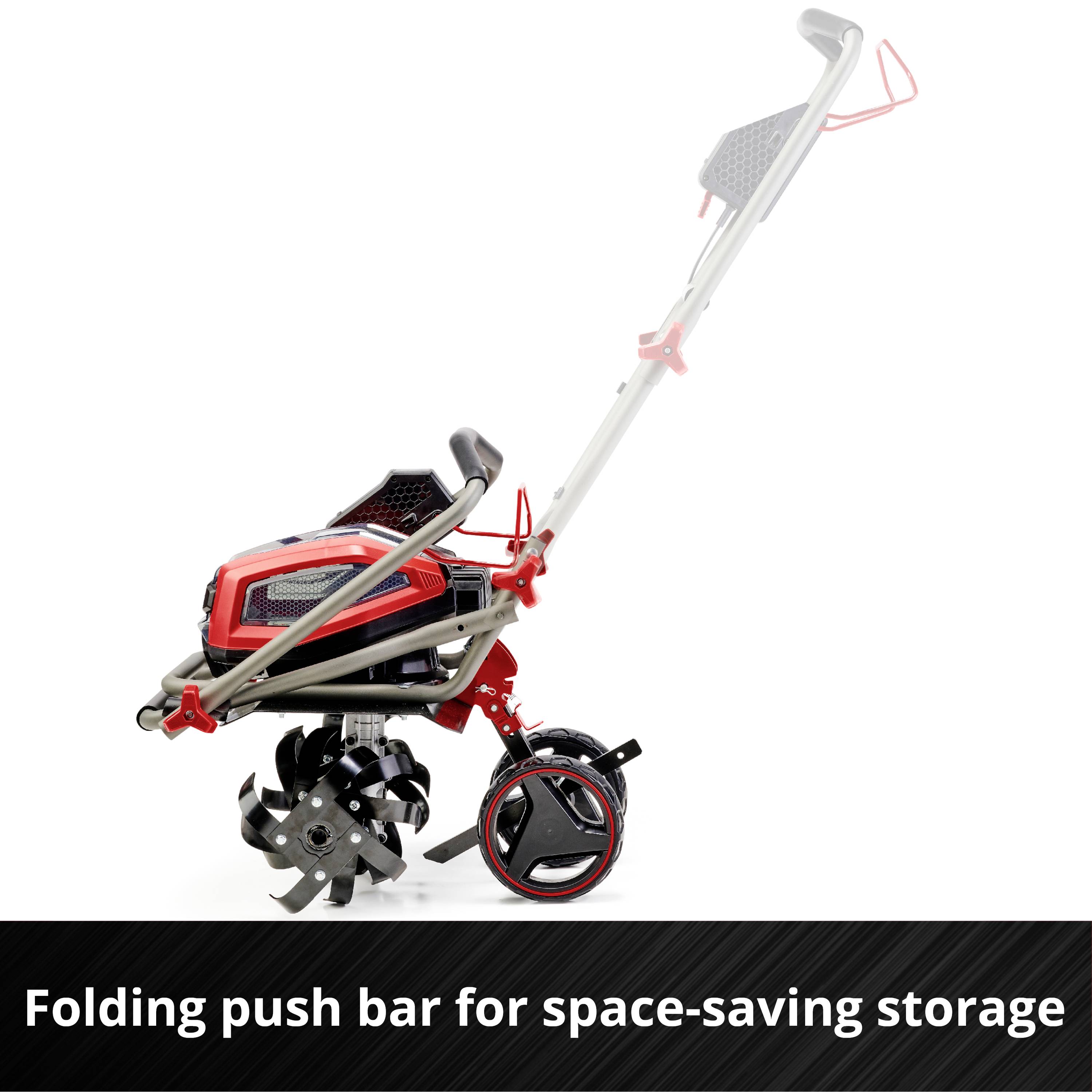 Red garden tiller with a foldable push handle for space-saving storage.