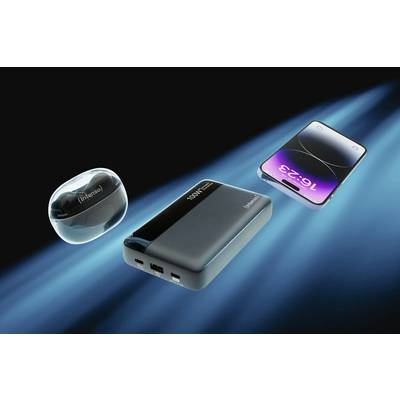 Smartphone, power bank and wireless headphones on a blue background. They are displayed floating to showcase modern technology.