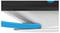 Close-up of a black plastic handle pulling a blue rubber band over a metal base. Robust construction.