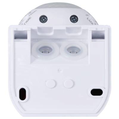 A white motion sensor with two lenses, suitable for detecting movement in a room. Two screws are visible at the top.