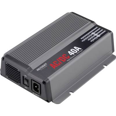 A black and grey Voltcraft AC/DC power supply, model 40A. It shows an on/off switch and AC input connections.