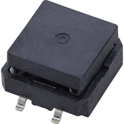 A black electronic component with a square shape and two metal connections at the bottom, positioned on a light surface.