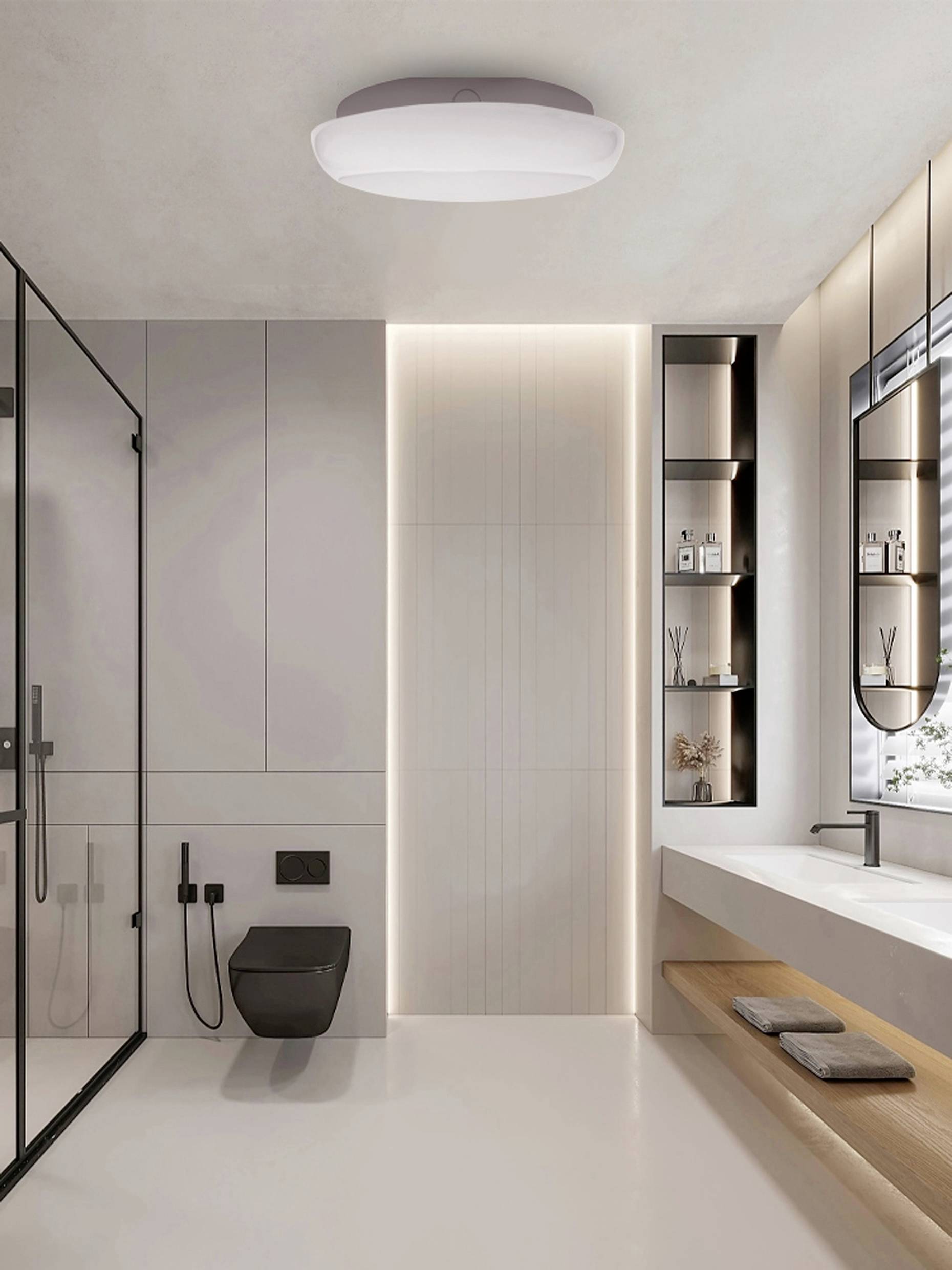 Modern bathroom with a walk-in shower, black wall-mounted toilet, floating sink with wooden shelves, and illuminated vertical panel.