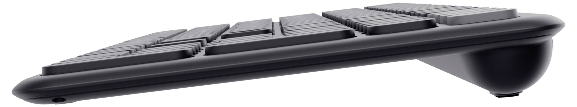 A side view of a flat, black keyboard with slightly angled keys, elevated on a stand.