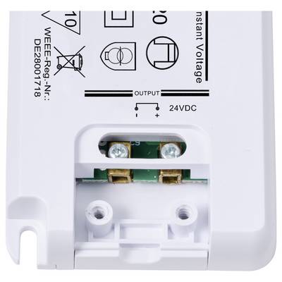 A white electrical device with visible connections, labels, and symbols, including 'Output' and '24VDC'.