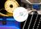 'LED lighting in various applications: warm white LED strips, blue-lit kitchen, modern living room, covered by LED lights. Central light switch for control.'