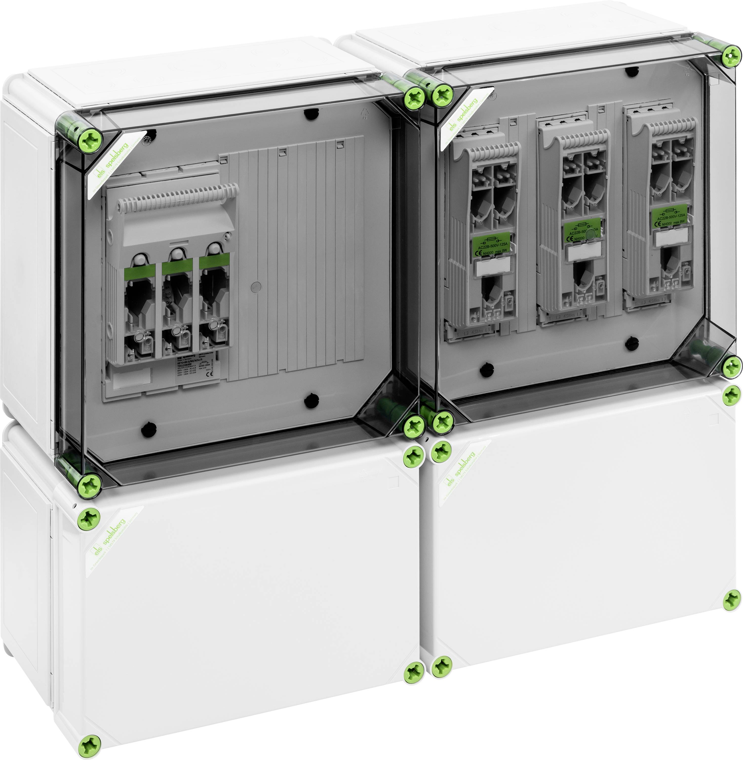 Four square housings with transparent covers display electronic components and slots for an industrial application.