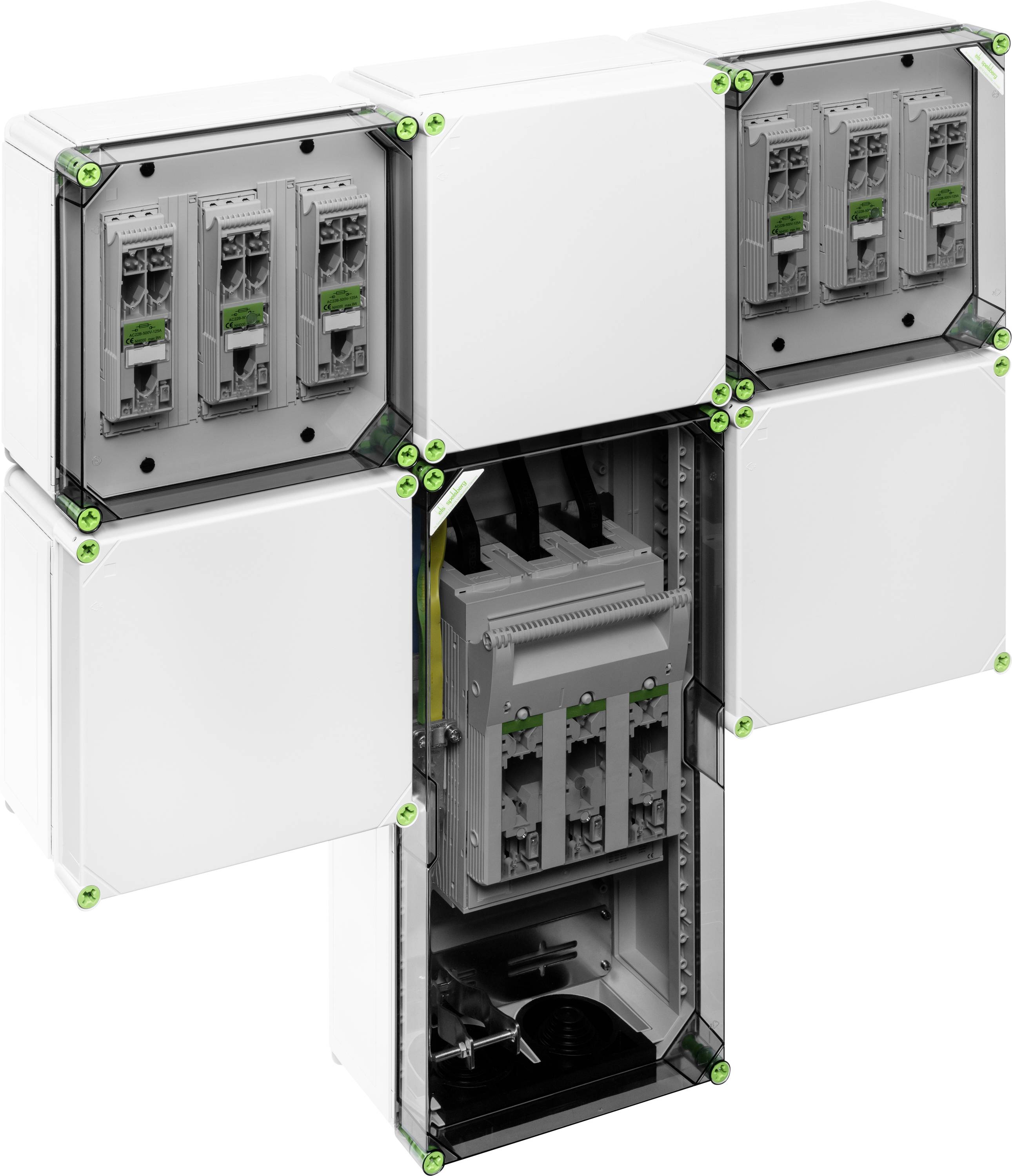 A grey, modular distribution box with white covers and green-marked connection points, opened to reveal its internal components.