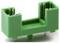 Green electrical connector with two slots, vertically mounted.
