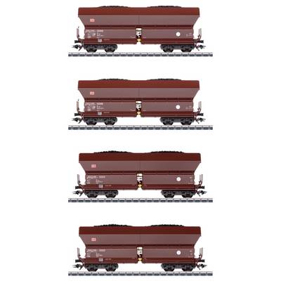 Four brown freight carriages loaded with coal on railway tracks, depicted in a series of identical photographs.