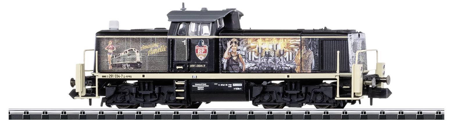 Model of a black locomotive with beige decoration on railway tracks. Detailed railway-themed graphics are located on the side.