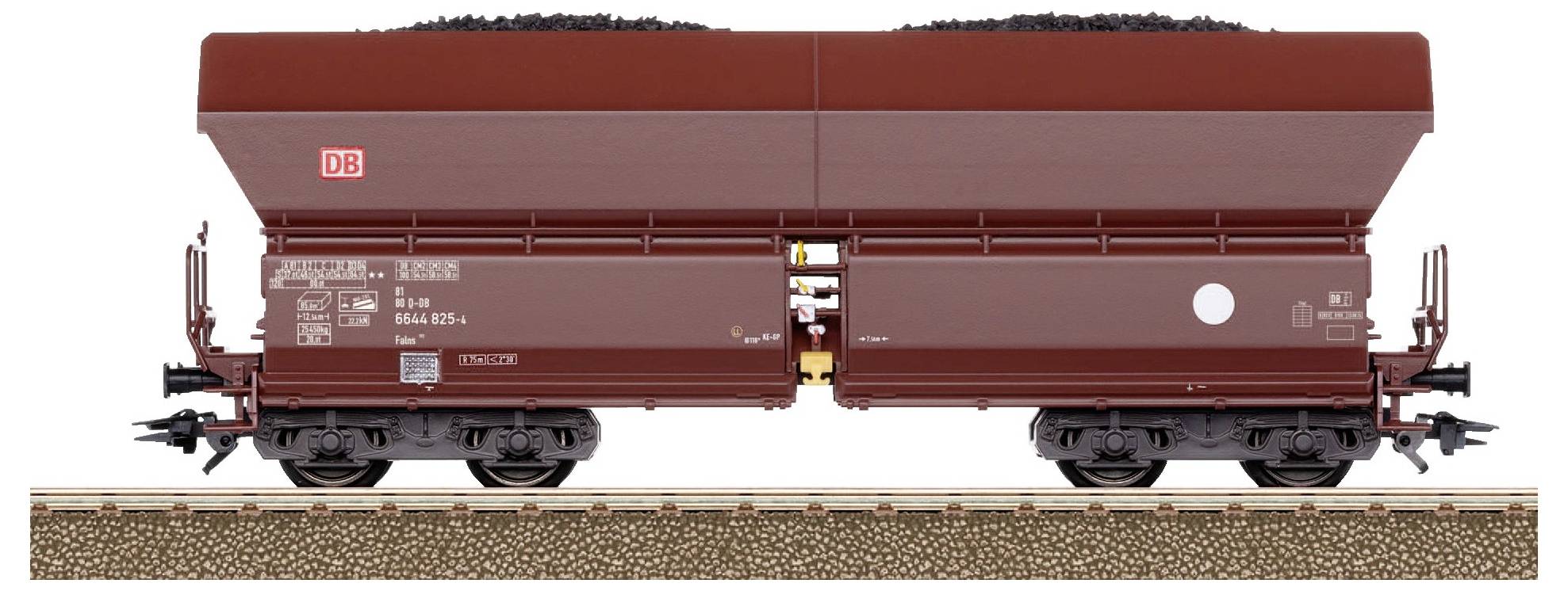 Goods wagon of Deutsche Bahn on railway tracks, laden with coal.