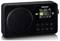 A portable DAB radio with a display. The display shows '1LIVE'. The speaker is on the left, with control buttons for settings on the right.